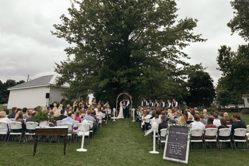 View of outdoor wedding at The Barn on the Hill wedding venue near Mt. Morris, Illinois